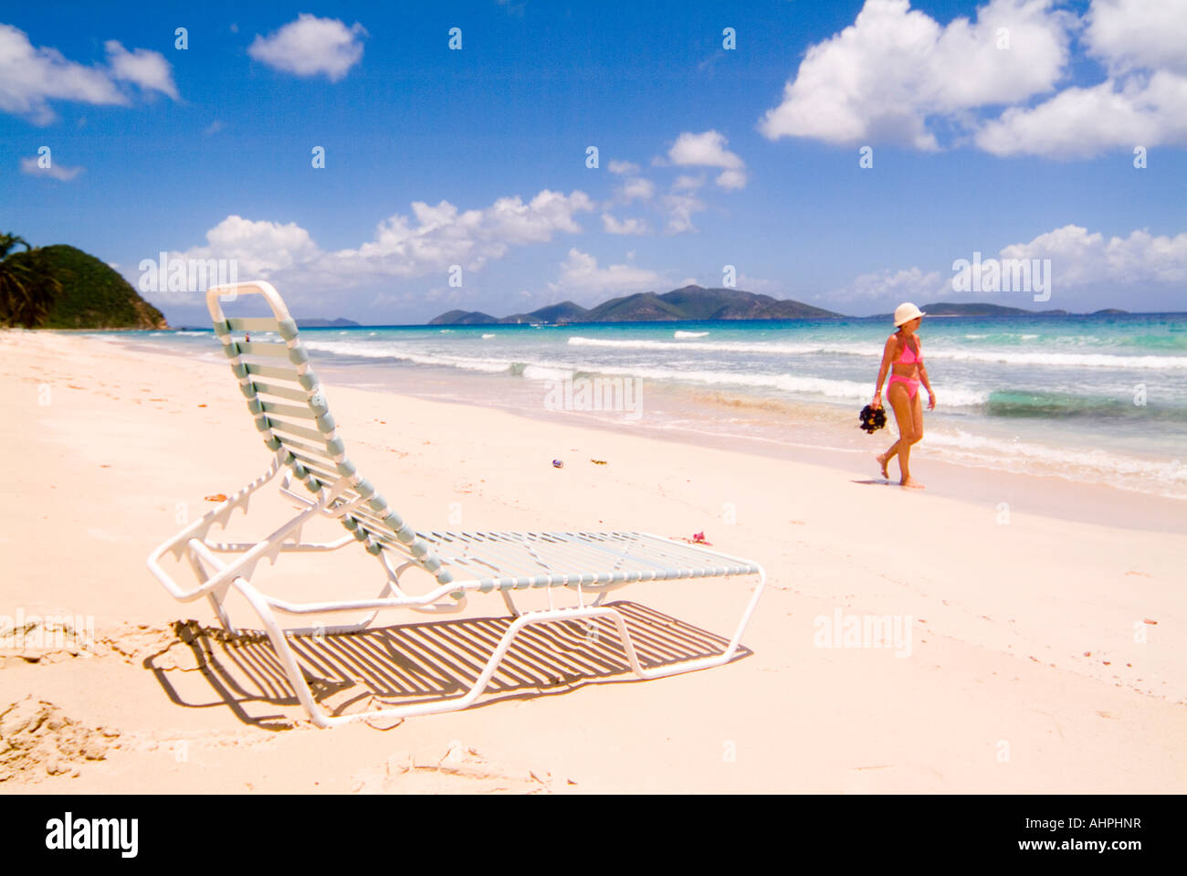 Woman walking on Tropical Beach Stock Photo