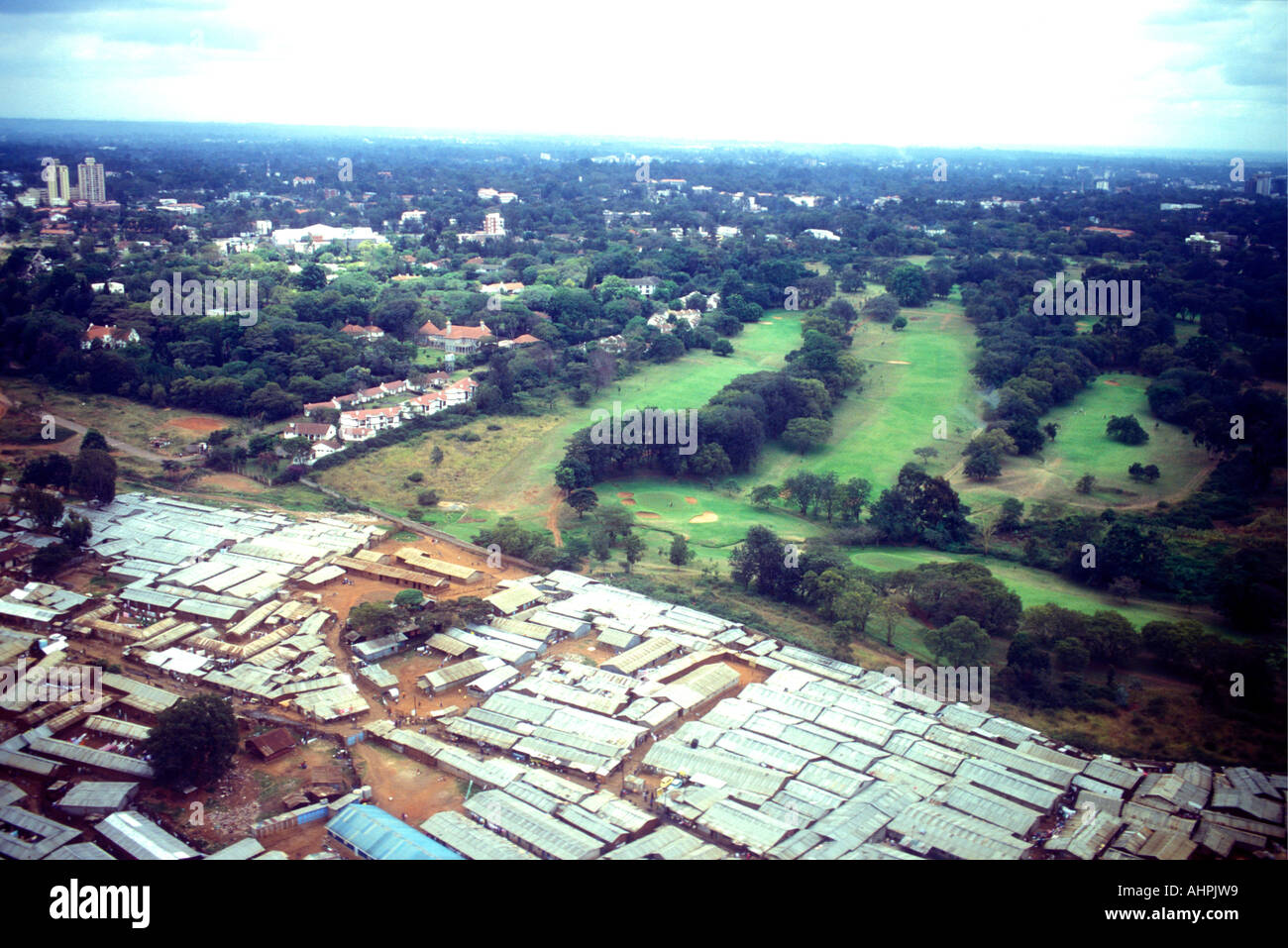 Aerial view of Kibera slum and the adjacent Royal Nairobi Golf Club Nairobi Kenya East Africa Stock Photo