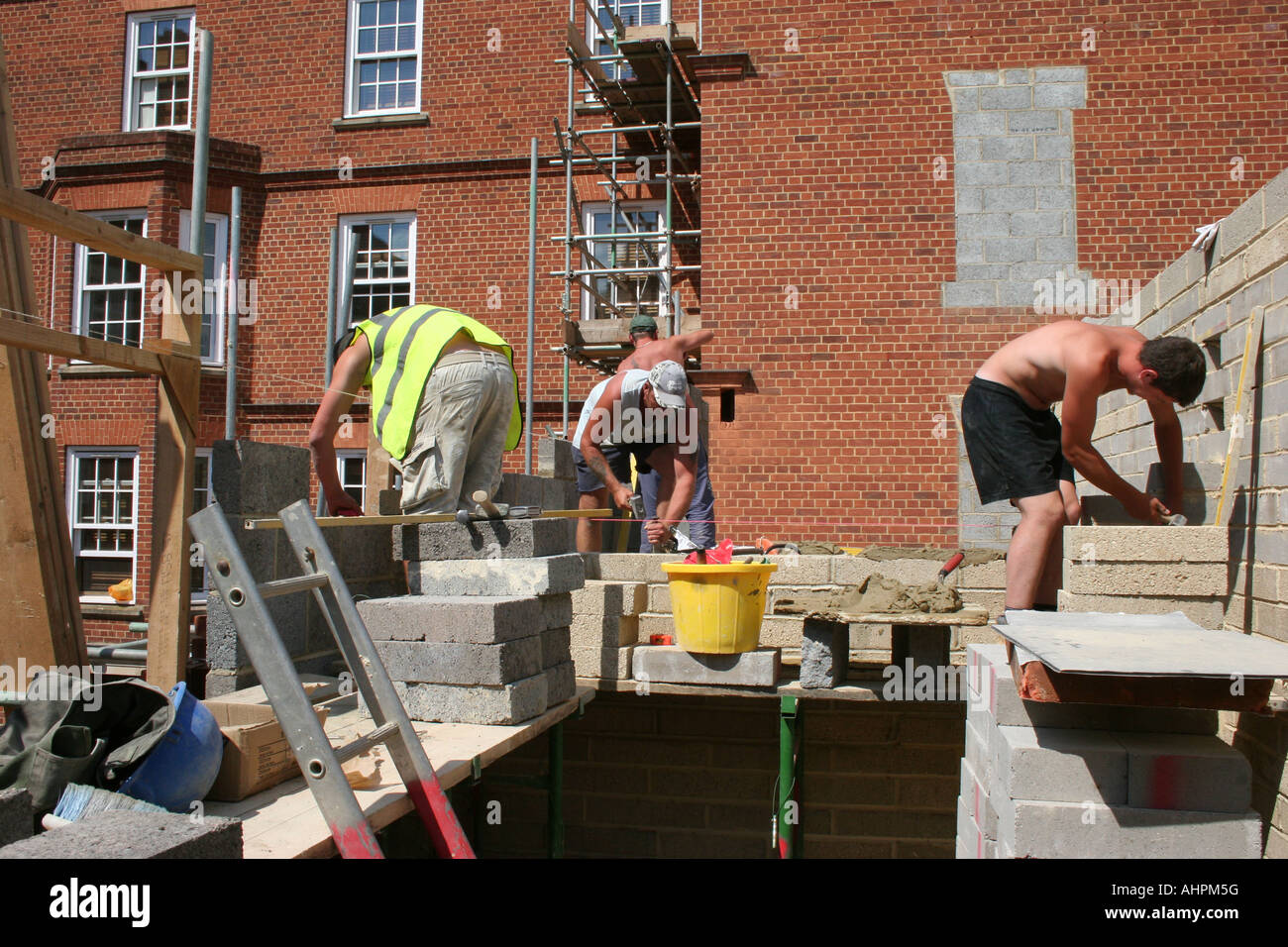 Brick layers at work in the UK Stock Photo