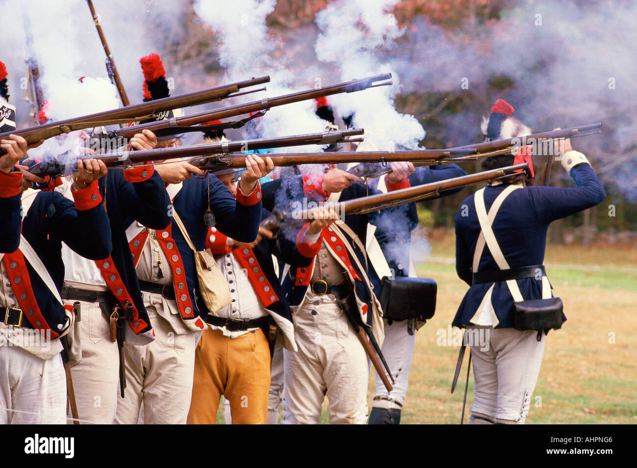 Continental soldiers firing rifles at American Revolutionary War re enactment Stock Photo