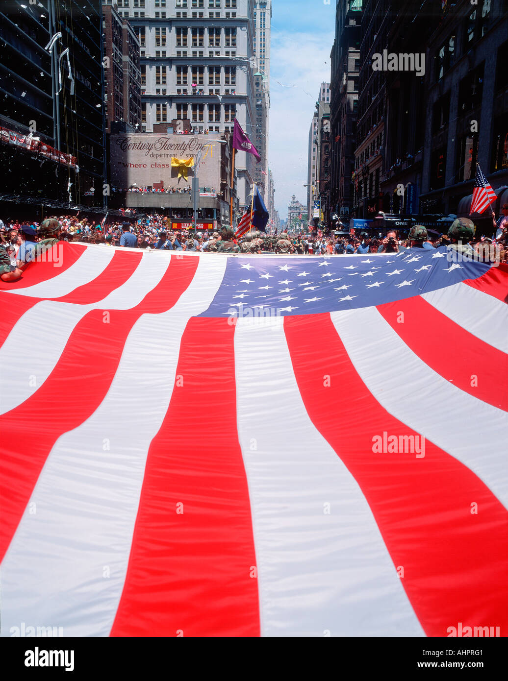 Large U S flag at Desert Storm Victory ticker tape parade New York City New York Stock Photo