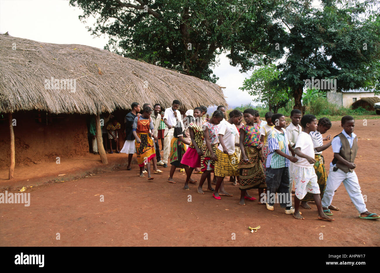 Rural schoolchildren changing classrooms, walking in line. Mozambique Stock Photo