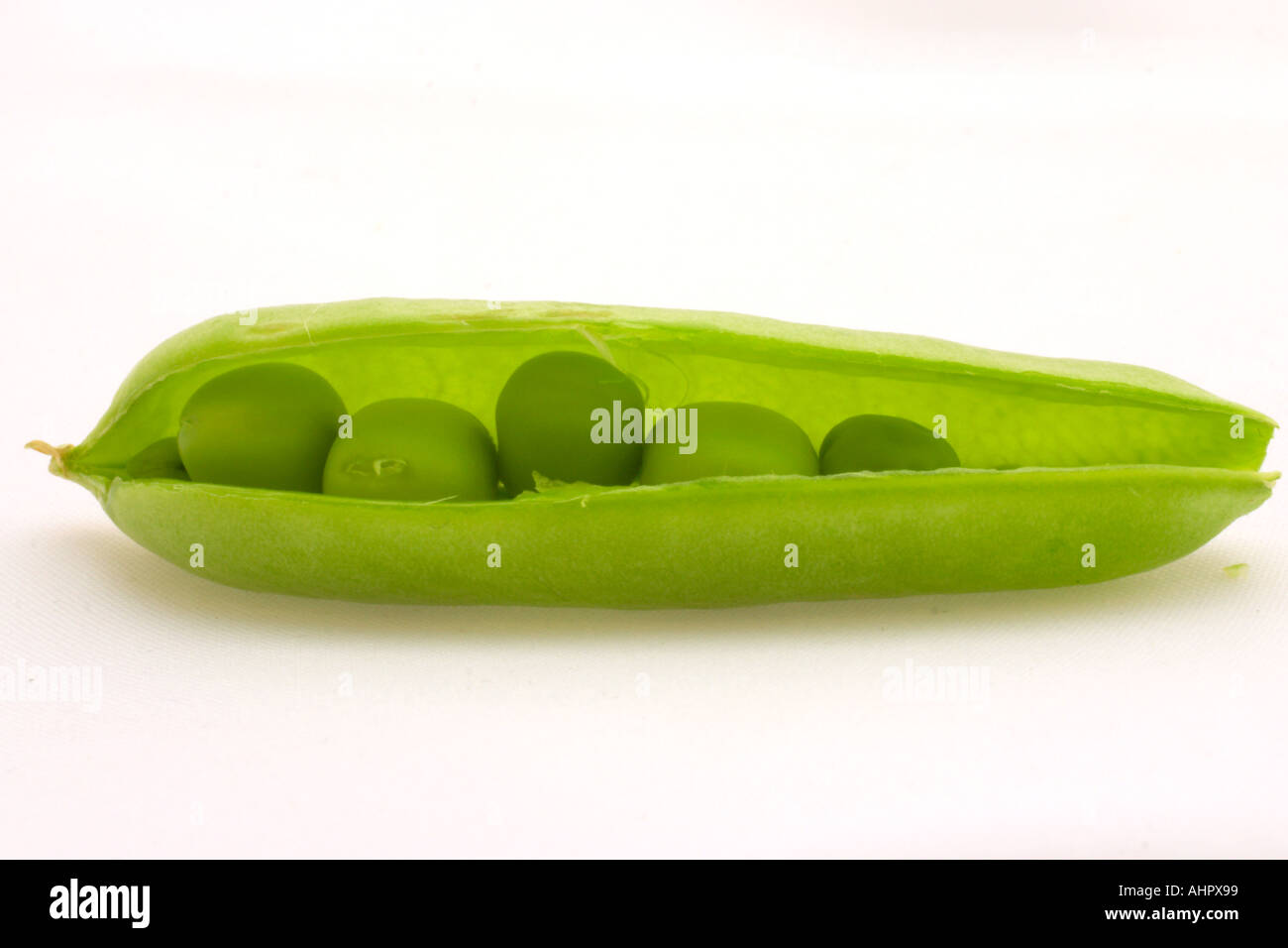 An open pea pod Stock Photo Alamy
