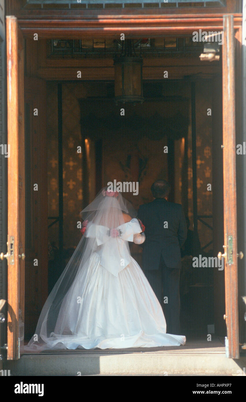 Rear view of bride entering church in Brooklyn New York Stock Photo