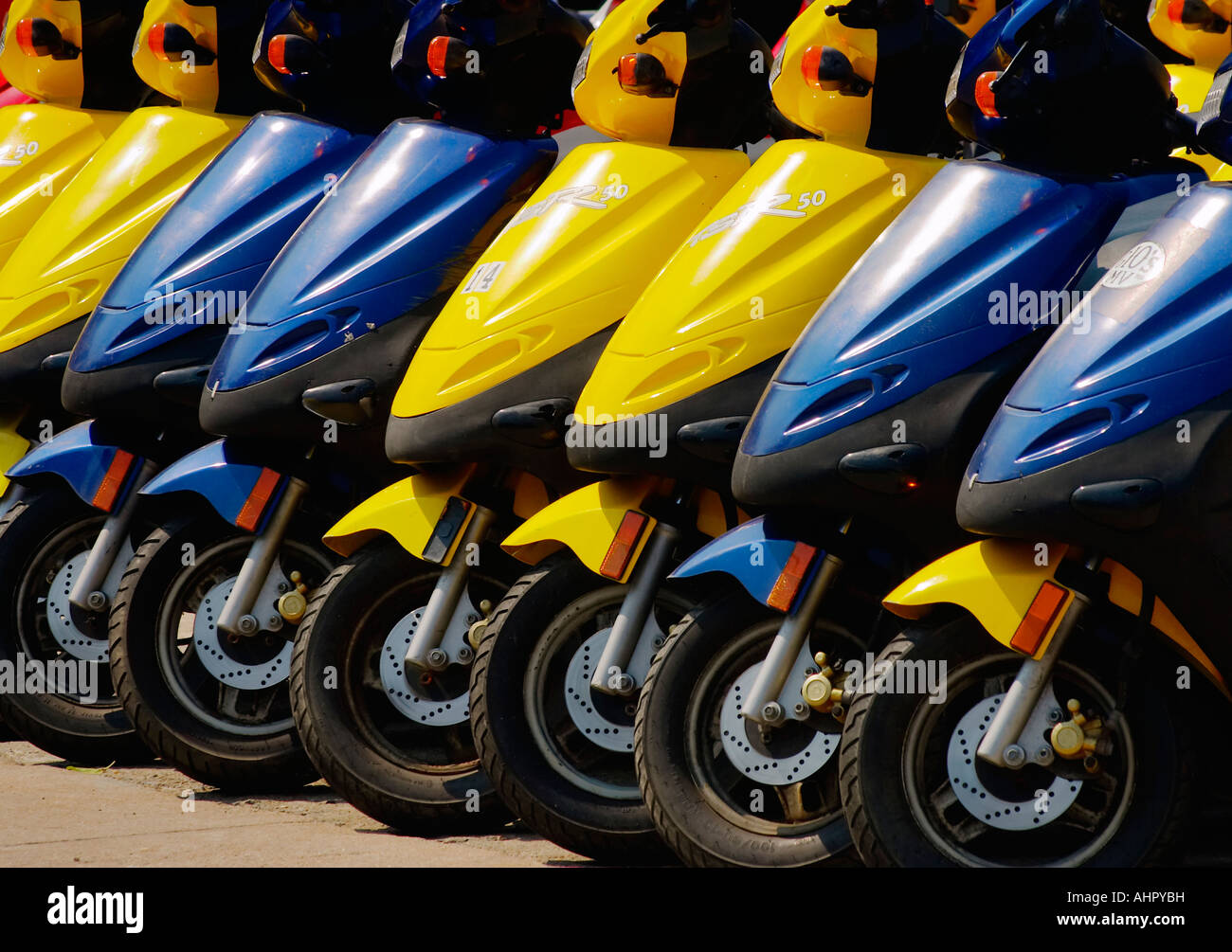 Motorscooters neatly parked in Martha s Vineyard Stock Photo