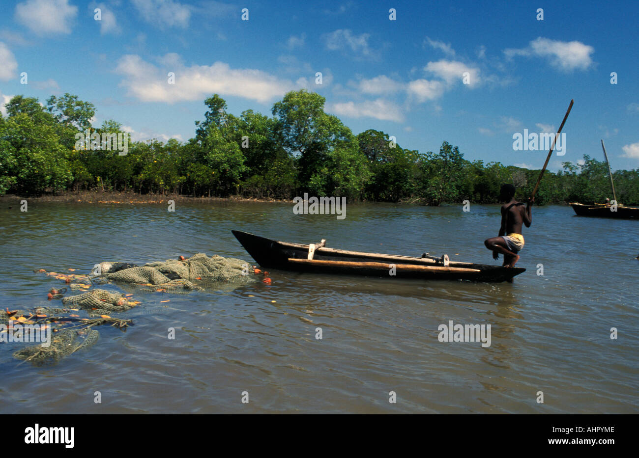 Fishing canoe between mangroves, Ibo Island, Mozambique Stock Photo - Alamy