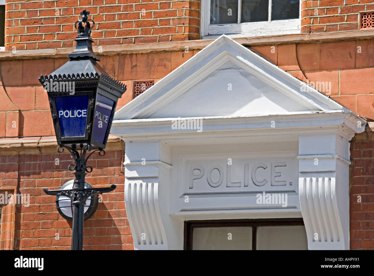 The Metropolitan Police blue lamp outside a city police station Stock Photo