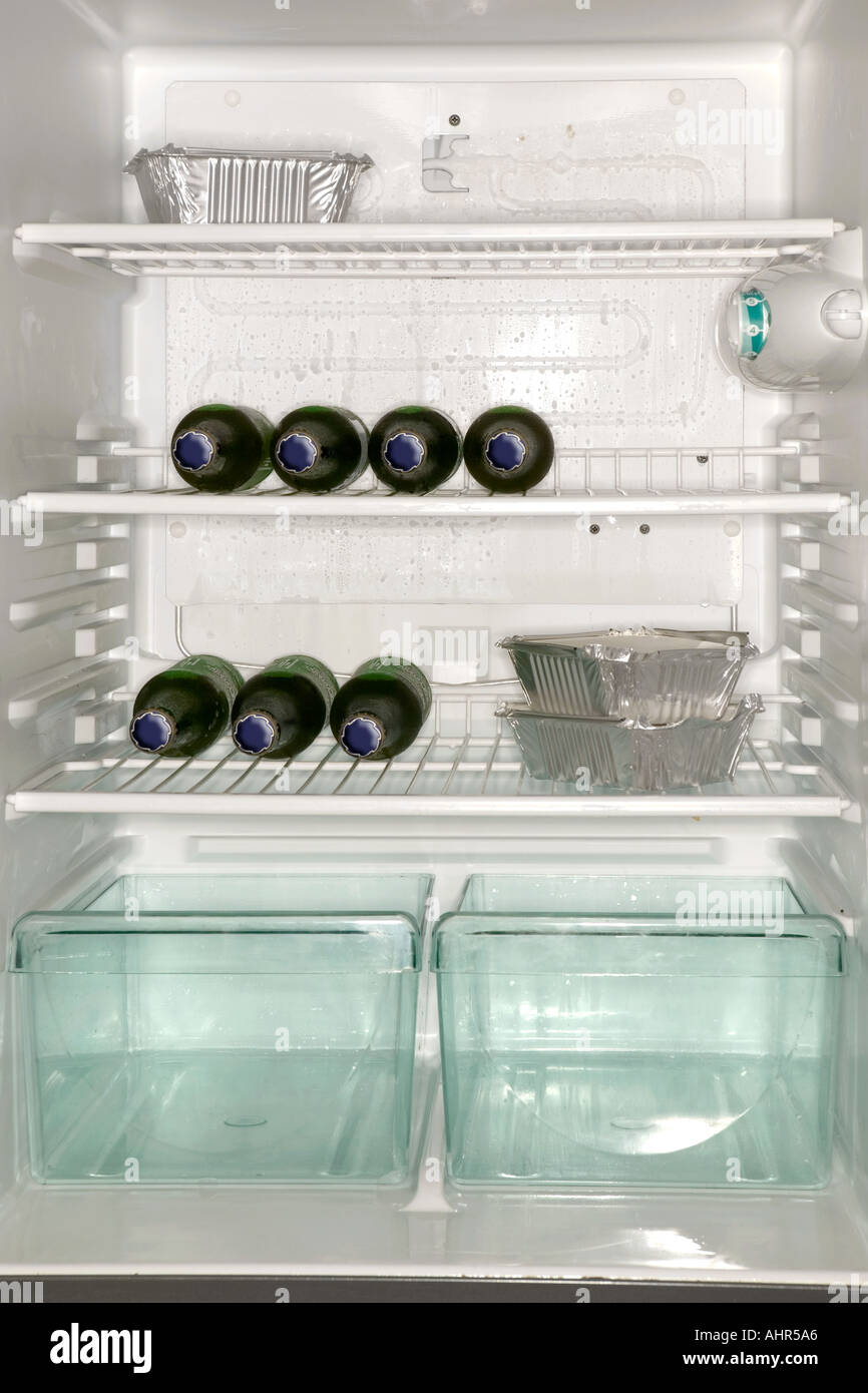 Fast food and beer bottles in a refrigerator Stock Photo Alamy