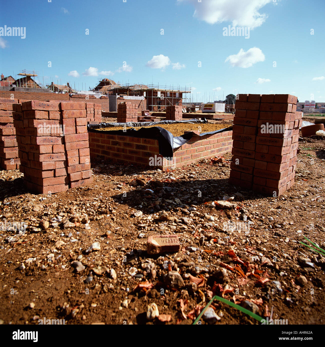 Stacked bricks on construction site Stock Photo