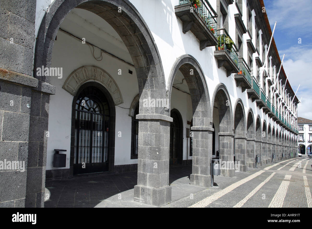 Street with arches in downtown Ponta Delgada Sao Miguel island Azores Portugal Stock Photo