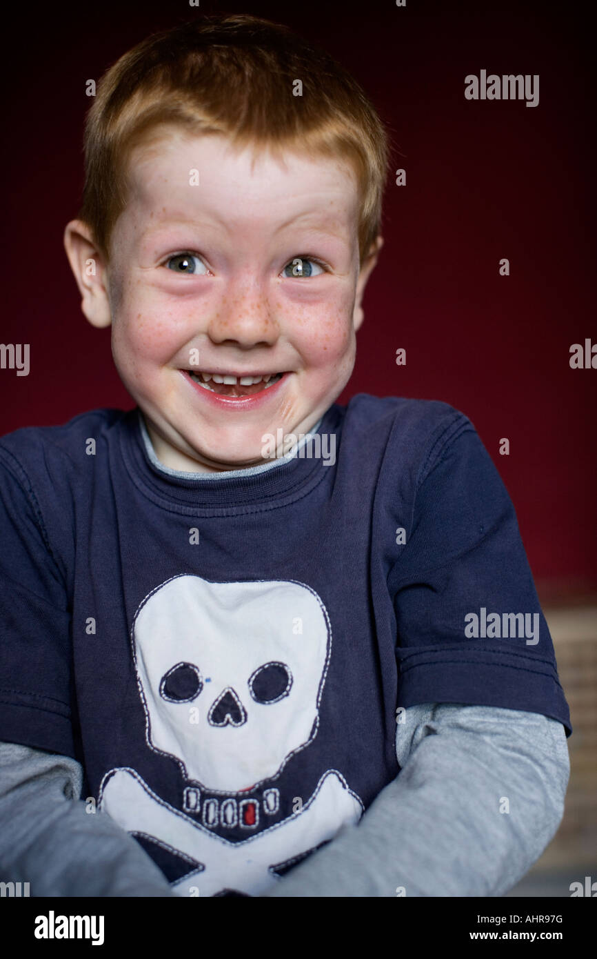 cheeky boy smiling Stock Photo