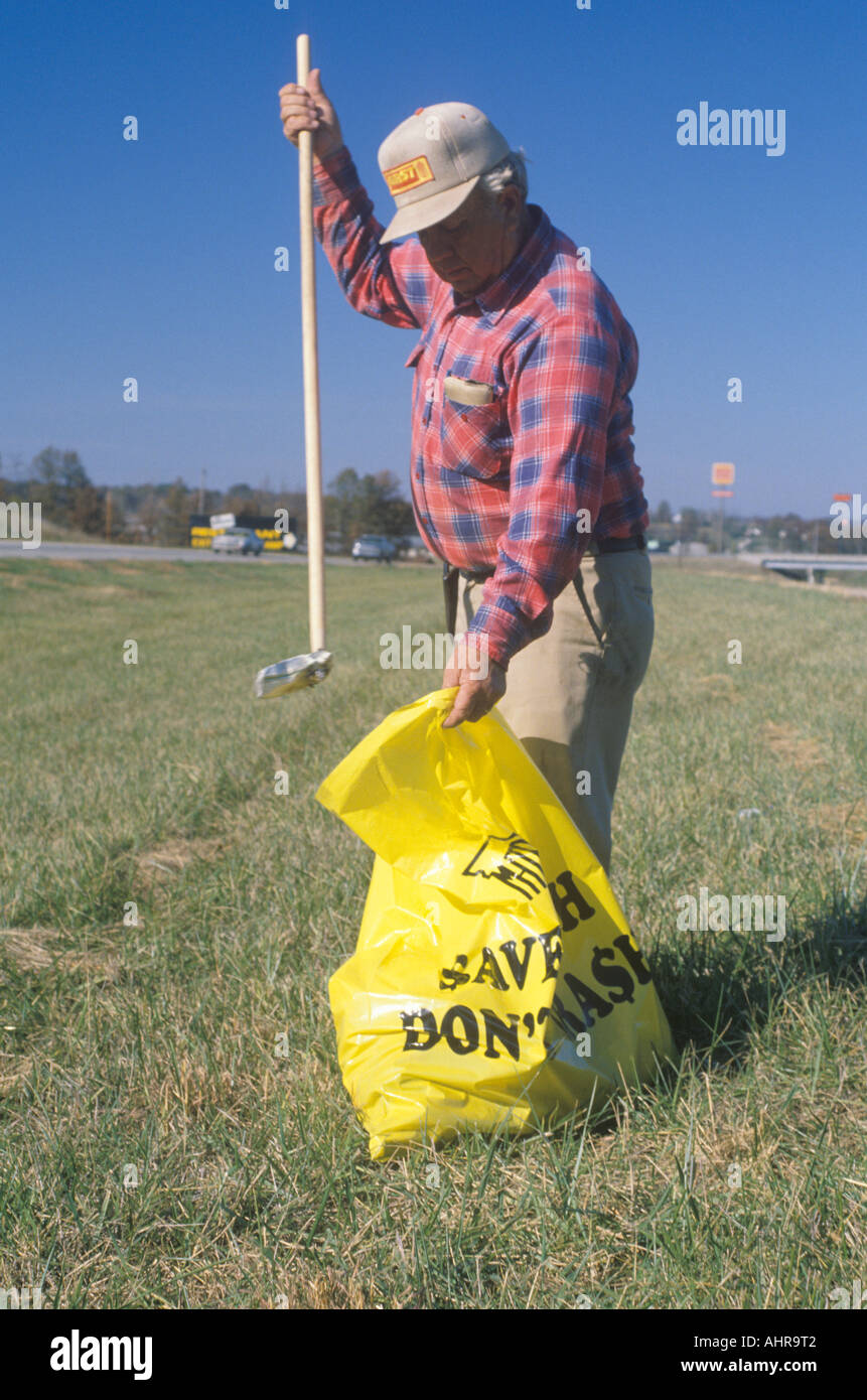 A man working for an adopt a highway campaign Stock Photo