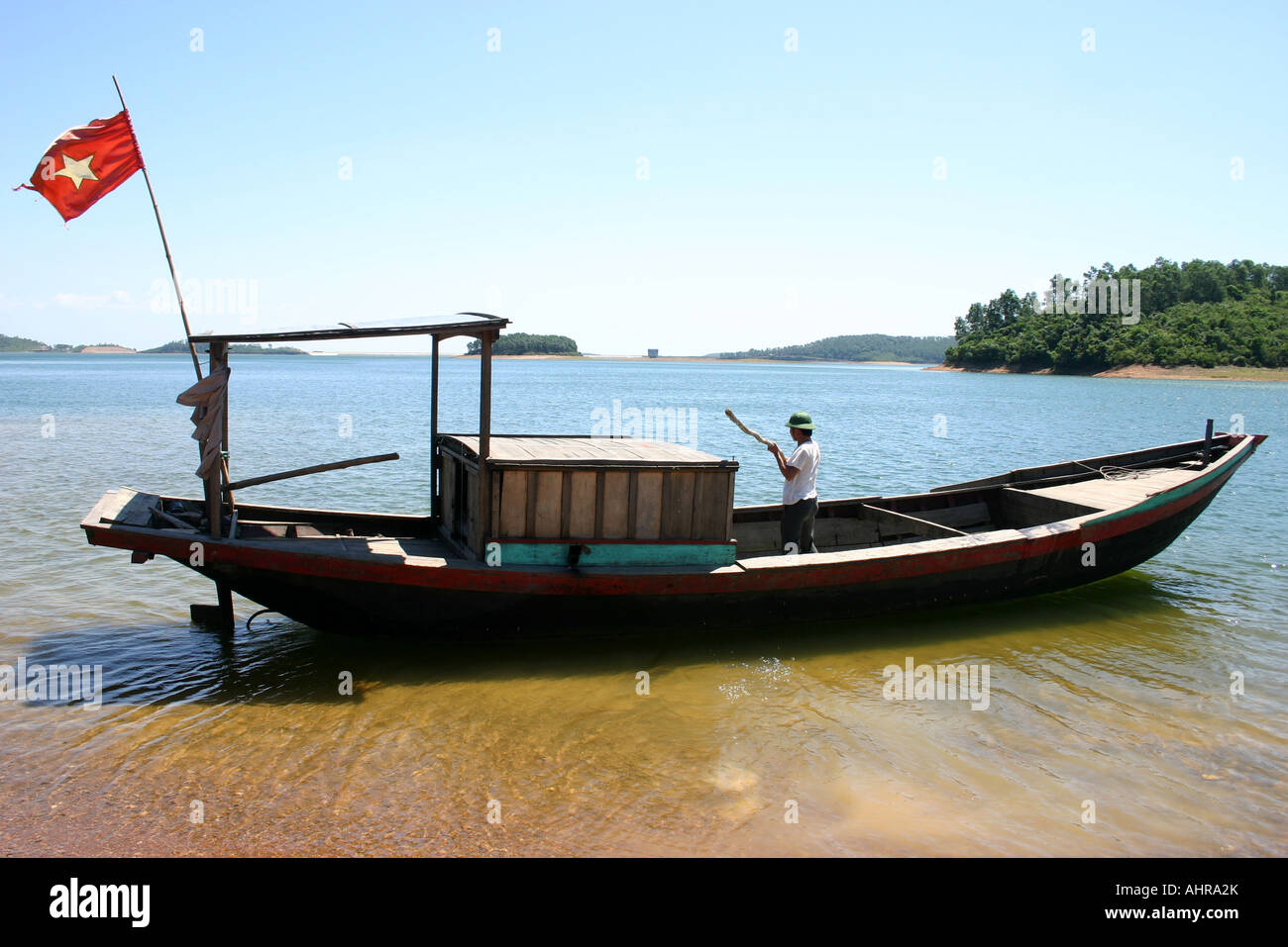 Wooden boat beached in Vietnam Stock Photo Alamy