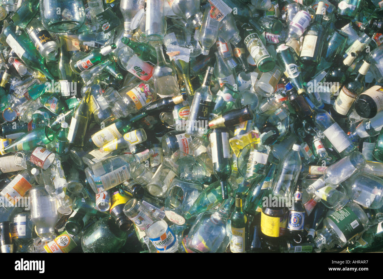 A pile of glass beverage bottles waiting for recycling at a center in Santa Monica California Stock Photo