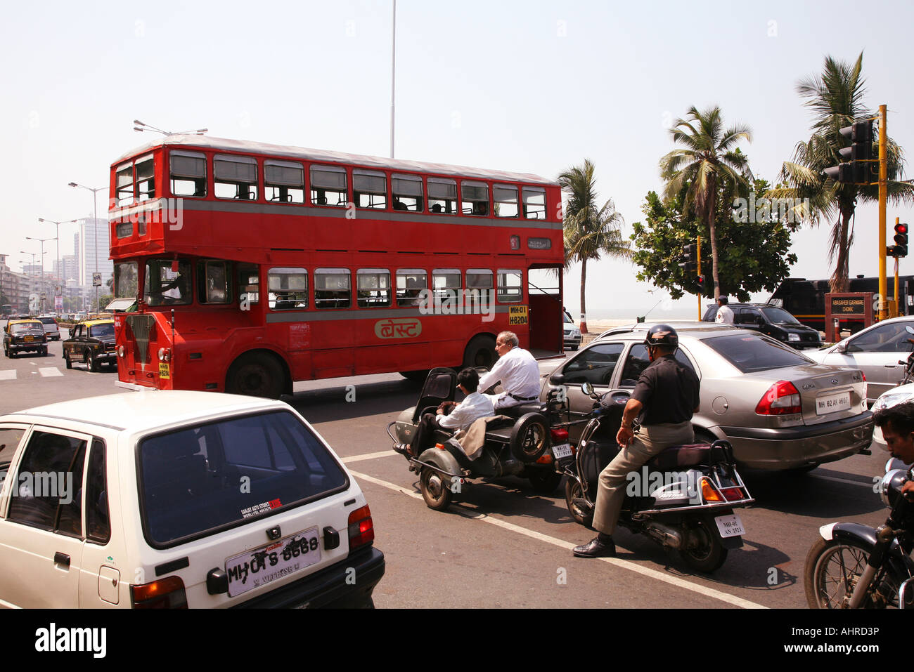 red bus mumbai india traffic funny polution Stock Photo - Alamy