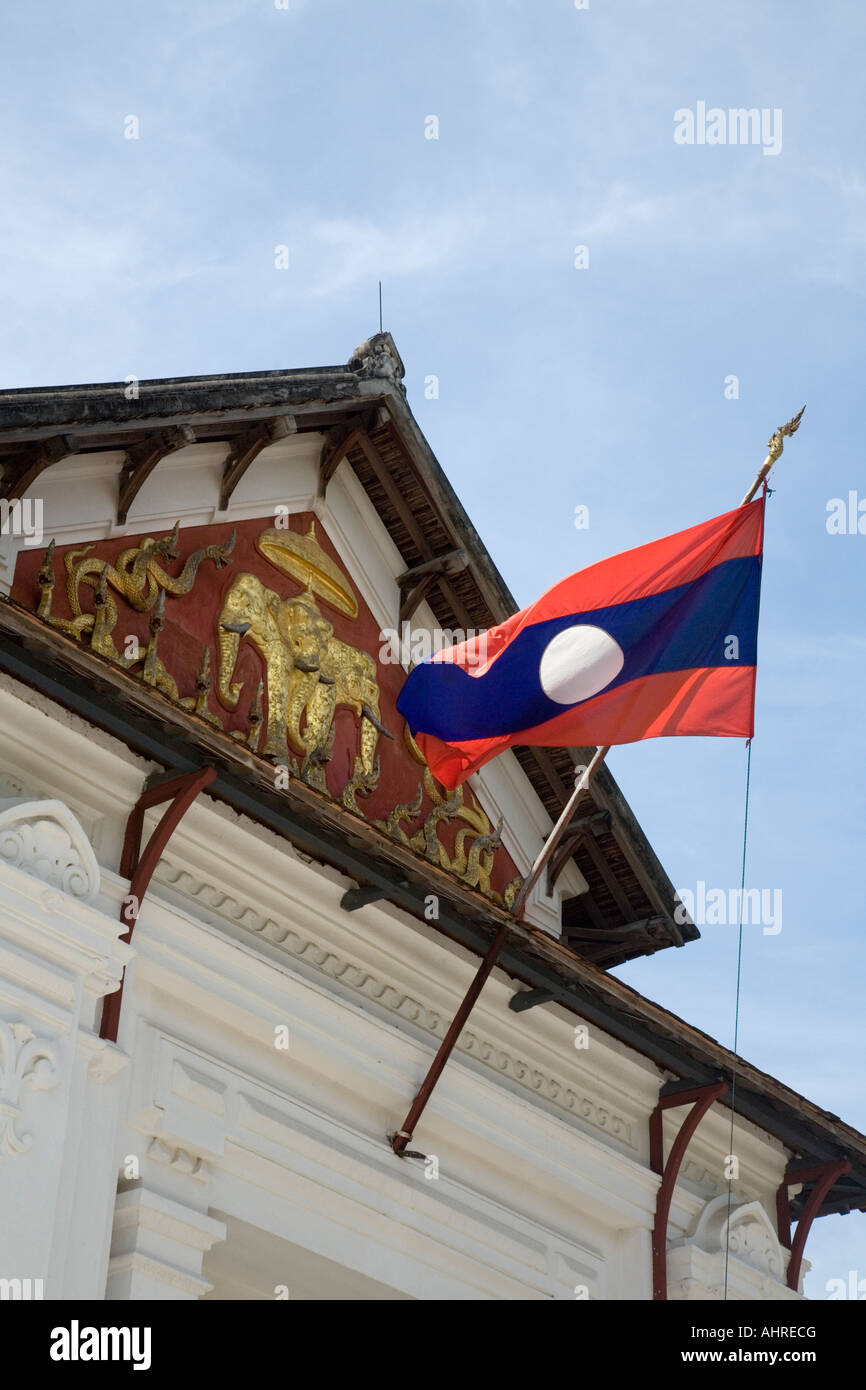 Lao flag at the entrance of the Royal Palace Museum in Luang Prabang Laos Stock Photo