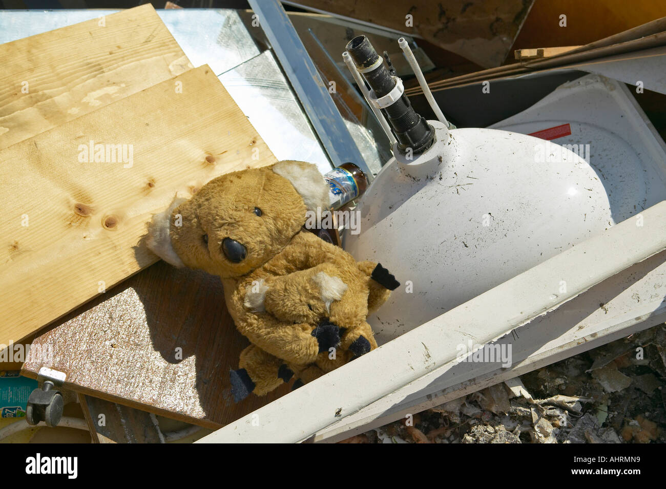 Teddy Bear on couch sits atop rubble after Hurricane Ivan strikes home in Pensacola Florida Stock Photo