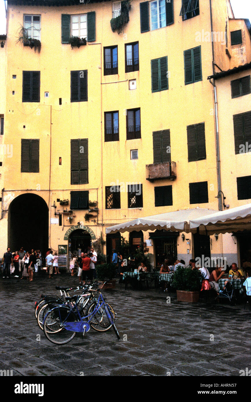 Bicycles parked in the Anfiteatro Romano, Lucca, Italy. Stock Photo