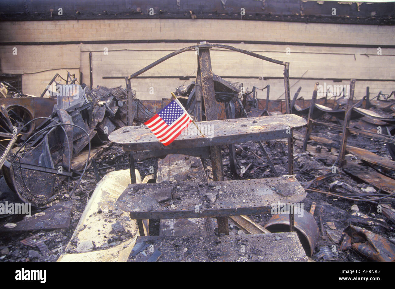 Small American flag at site of 1992 riots South Central Los Angeles California Stock Photo