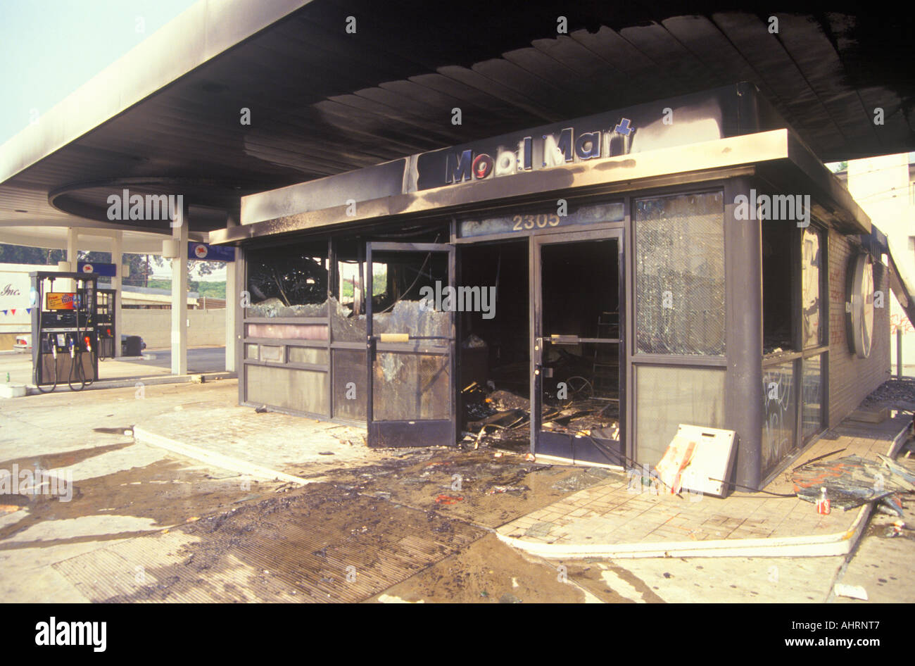 Gas station burned out during 1992 riots South Central Los Angeles California Stock Photo
