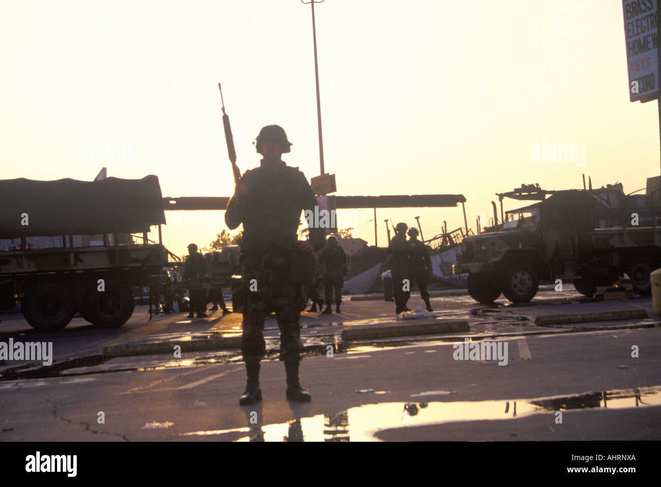 Silhouetted National Guard during 1992 riots South Central Los Angeles California Stock Photo