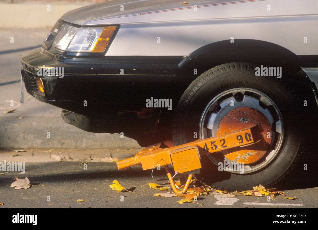 City wheel lock on illegally parked car Washington D C Stock Photo Alamy