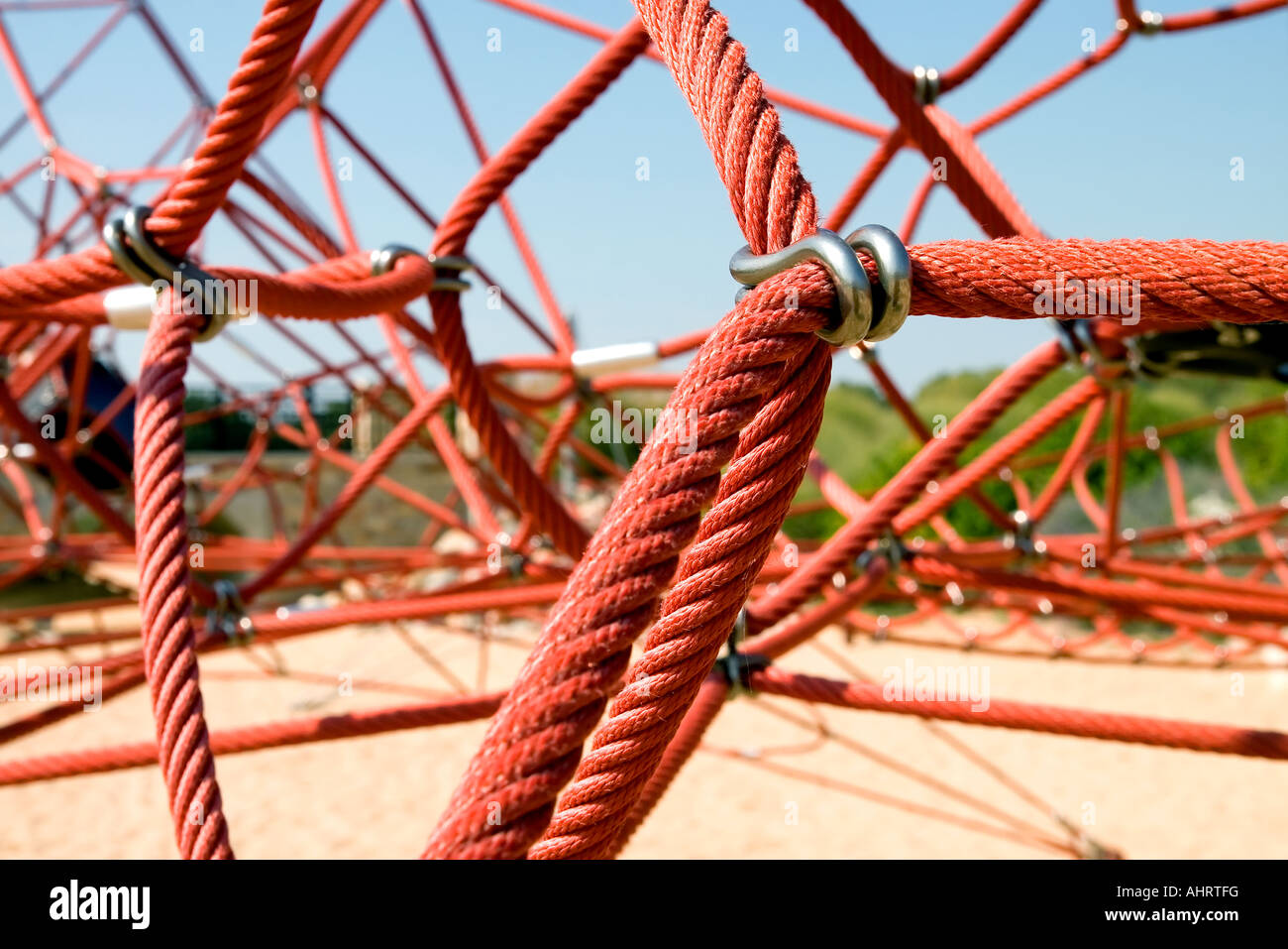 The red rope of climbing equipment in a children s playground Stock Photo