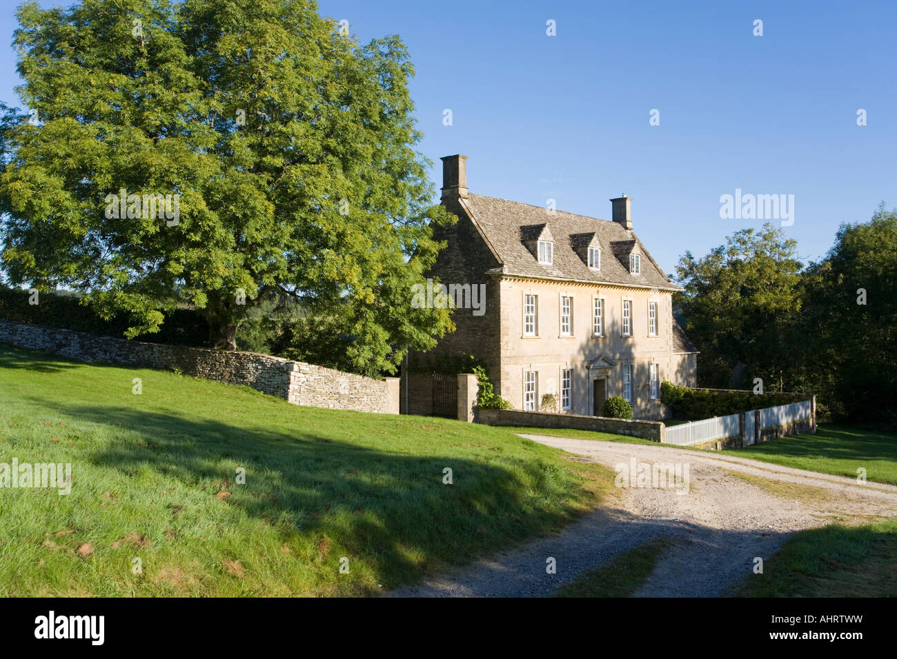 A Georgian fronted house in the Cotswold village of Caudle Green, Gloucestershire Stock Photo