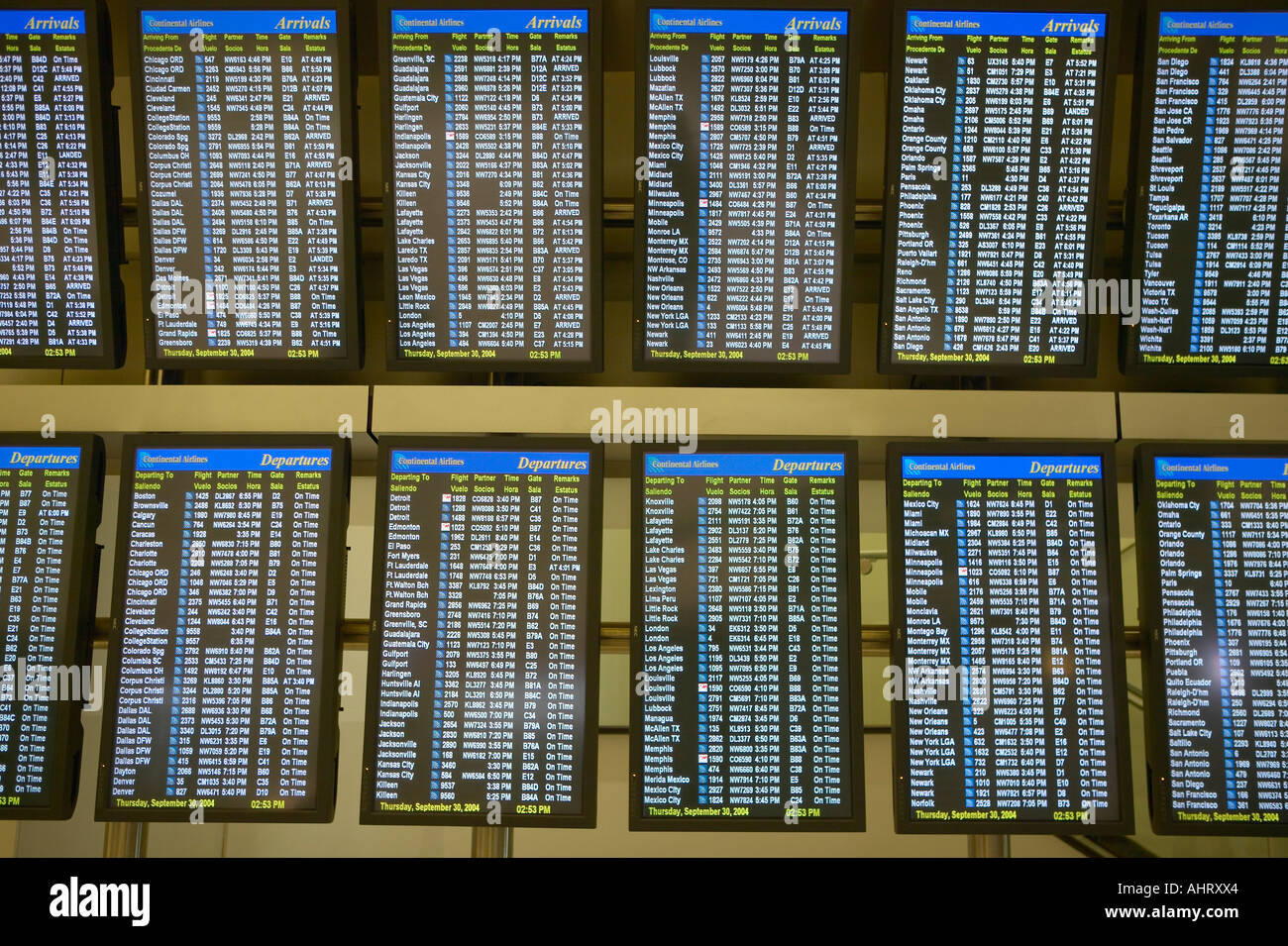 Airline flight schedules with departure and arrival times and gate information Stock Photo