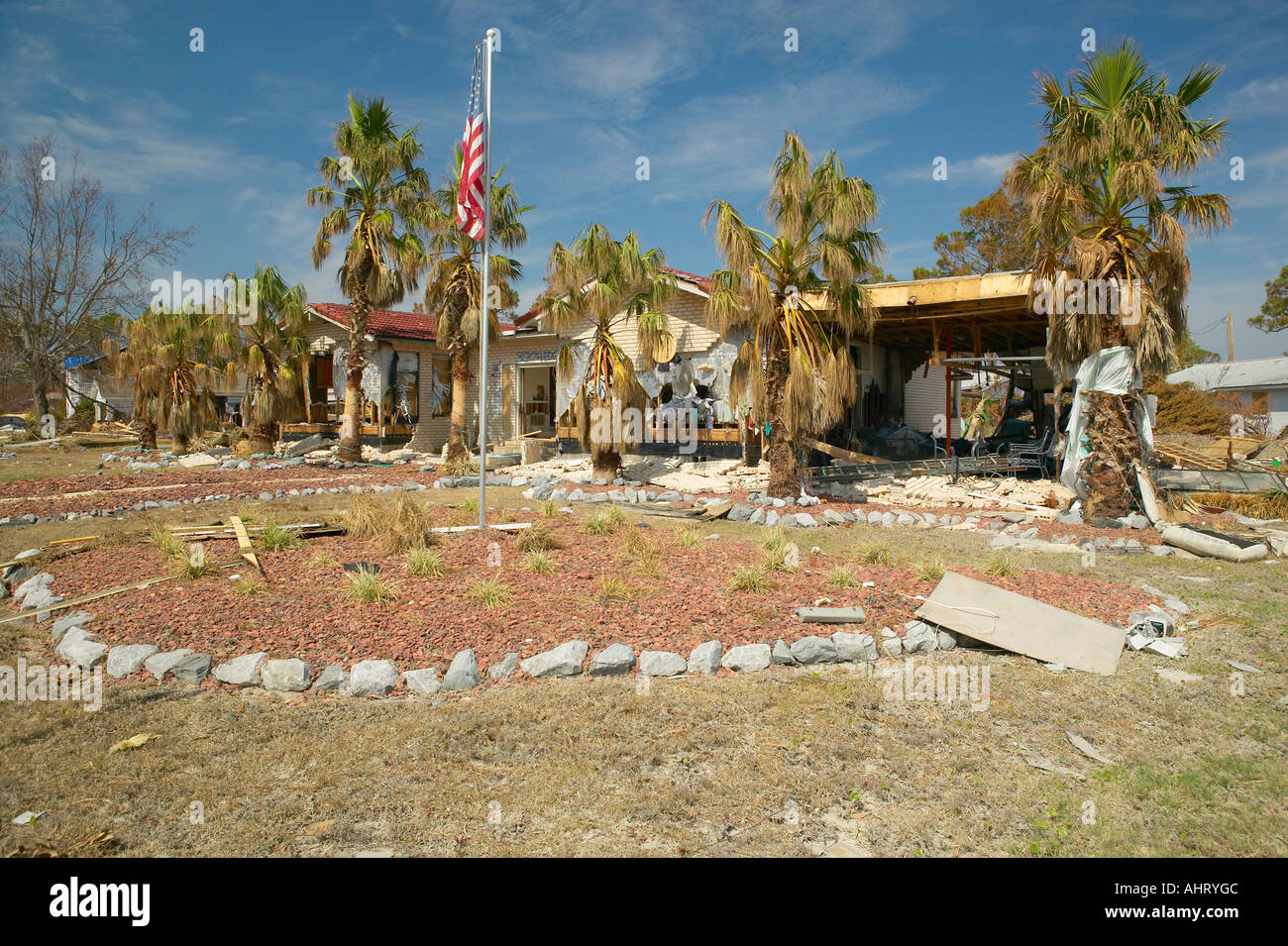 Debris in front of house heavily hit by Hurricane Ivan in Pensacola ...