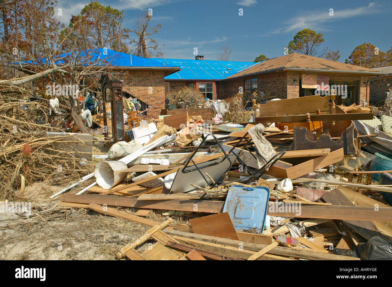 Debris in front of house heavily hit by Hurricane Ivan in Pensacola ...