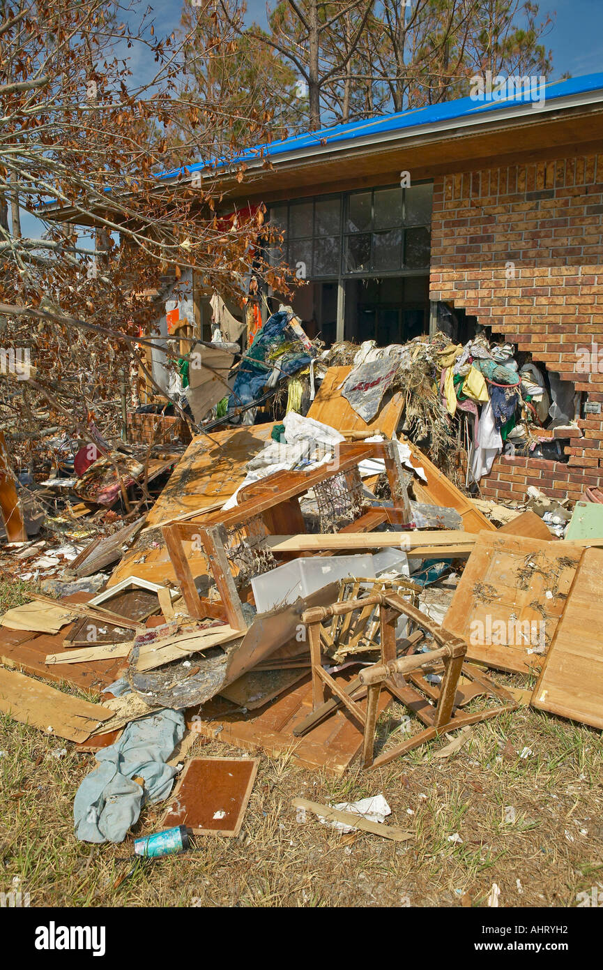 Debris in front of house heavily hit by Hurricane Ivan in Pensacola ...