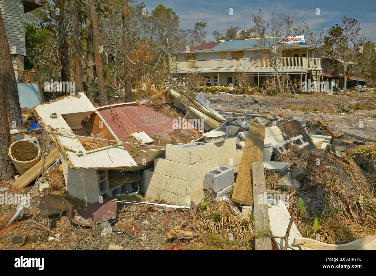 Debris in front of house heavily hit by Hurricane Ivan in Pensacola ...