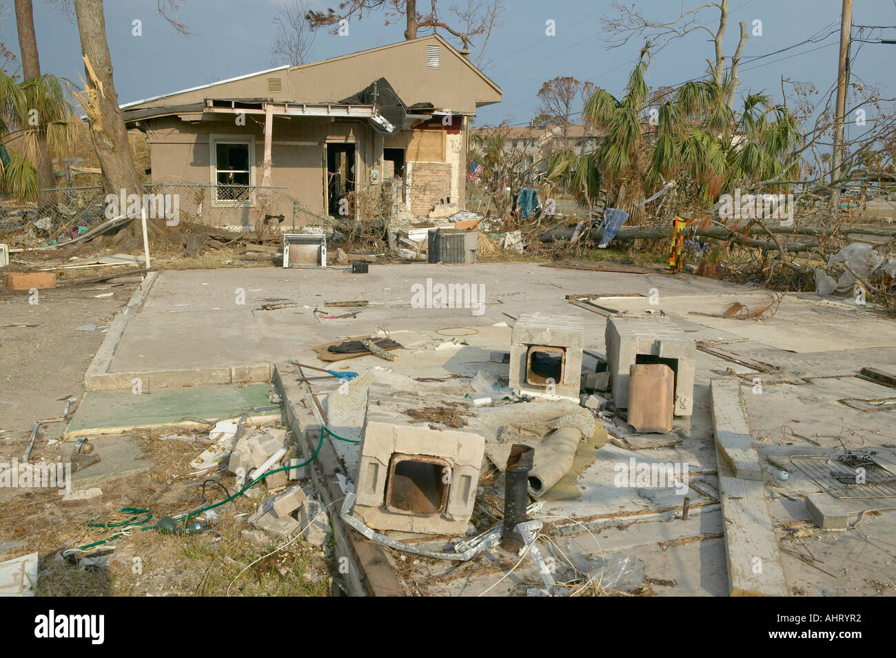 Debris in front of house heavily hit by Hurricane Ivan in Pensacola ...