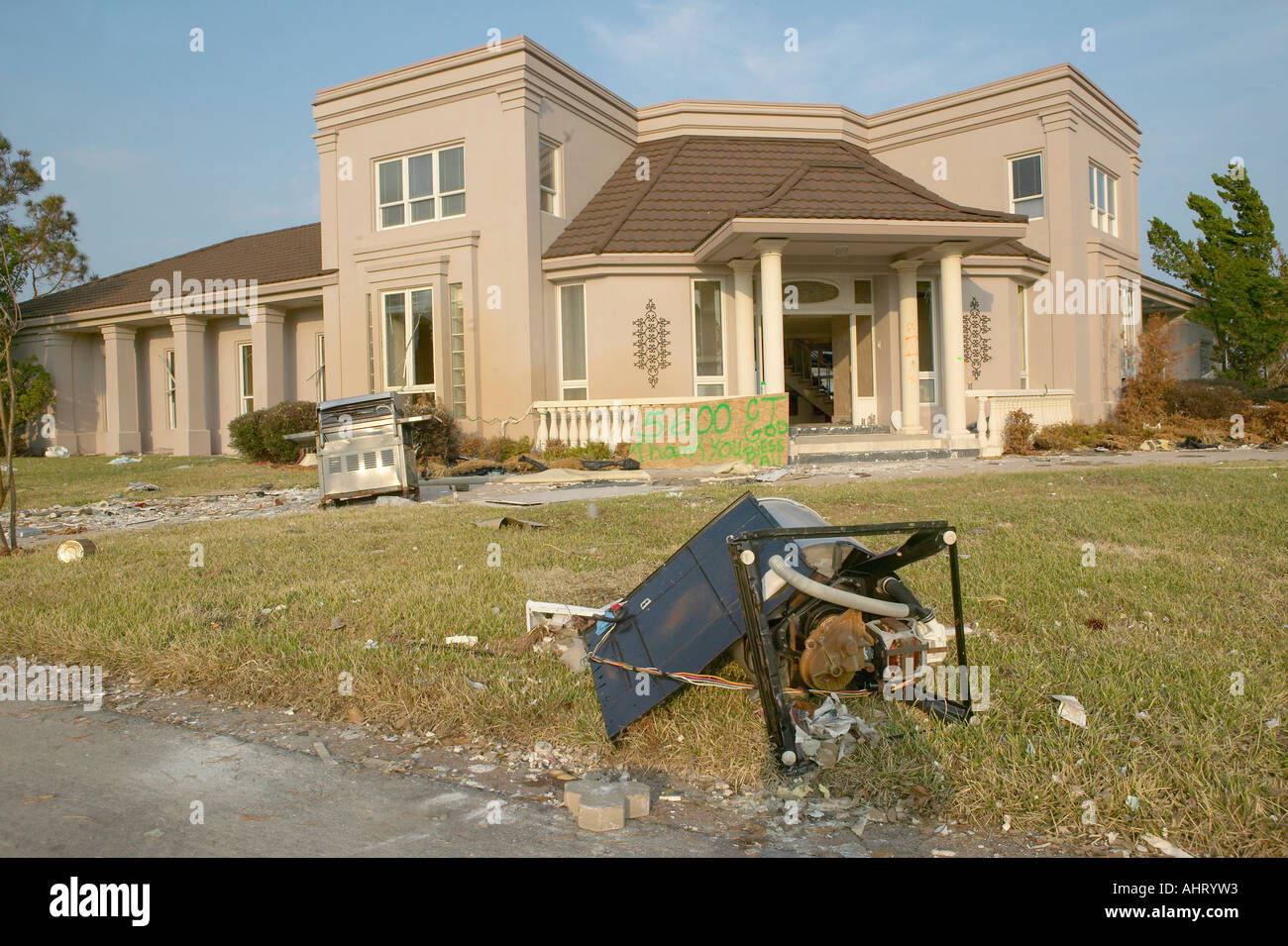 Debris in front of house heavily hit by Hurricane Ivan in Pensacola ...