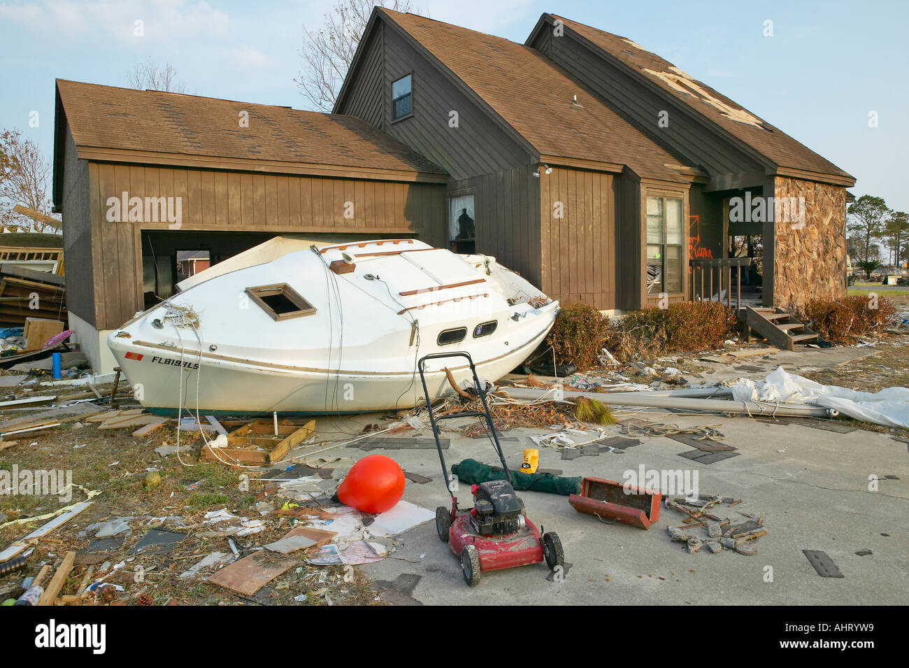Boat and debris in front of house heavily hit by Hurricane Ivan in ...