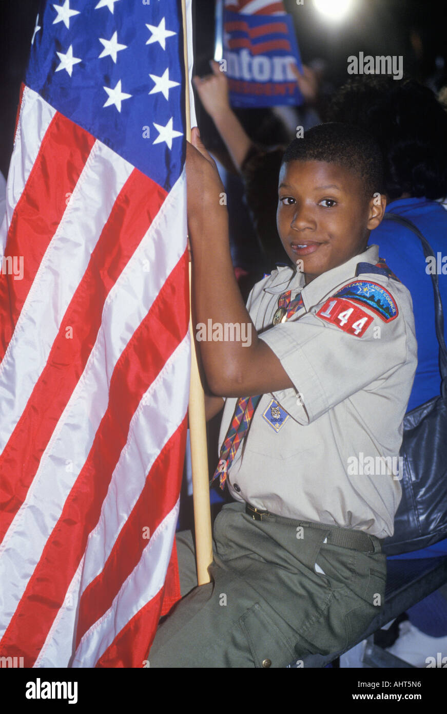 Boy Scout with an American flag at the Clinton Gore 1992 Buscapade campaign tour in Tyler Texas Stock Photo