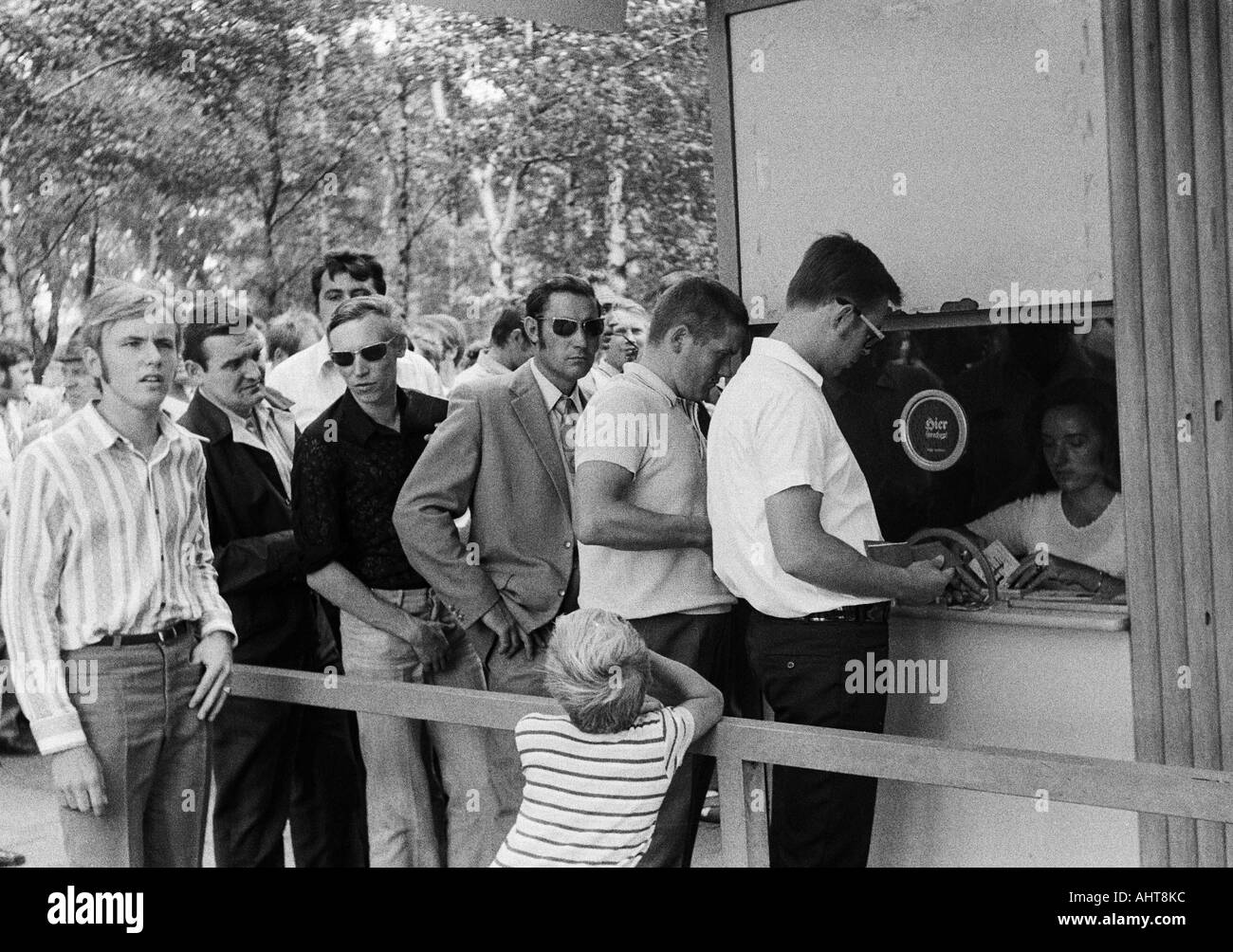 football, Bundesliga, 1971/1972, Wedau Stadium in Duisburg, MSV Duisburg versus Borussia Dortmund 2:1, opening of the season, spectators walk to the stadium, football fans line up and wait at the pay kiosk Stock Photo