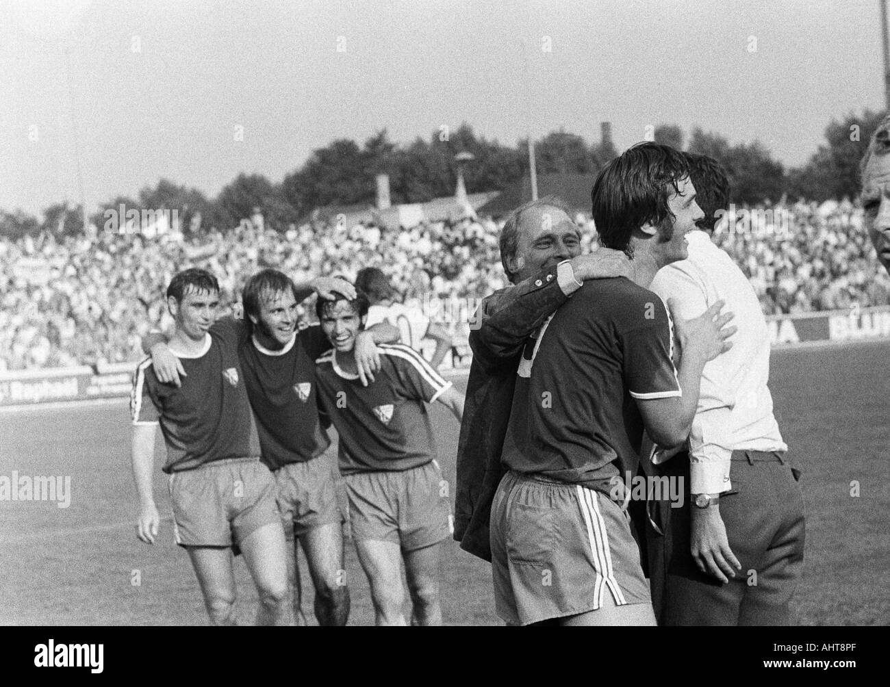 football, Bundesliga, 1971/1972, Niederrhein Stadium, Rot-Weiss Oberhausen versus VfL Bochum 2:3, Bochum football players rejoicing at the win, f.l.t.r. Werner Balte, Hans Werner Hartl, Dieter Fern and Hans Walitza Stock Photo