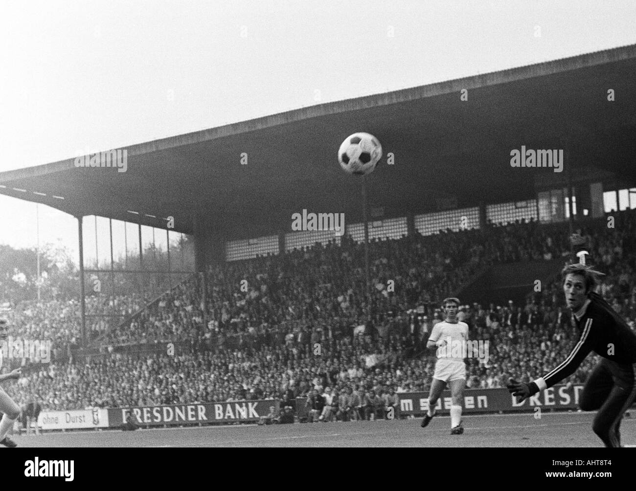 football, Bundesliga, 1971/1972, VfL Bochum versus Arminia Bielefeld 2:1, Stadium at the Castroper Strasse in Bochum, scene of the match, Gerd Wiesemes behind and keeper Hans Juergen Bradler (both Bochum) look after the ball Stock Photo