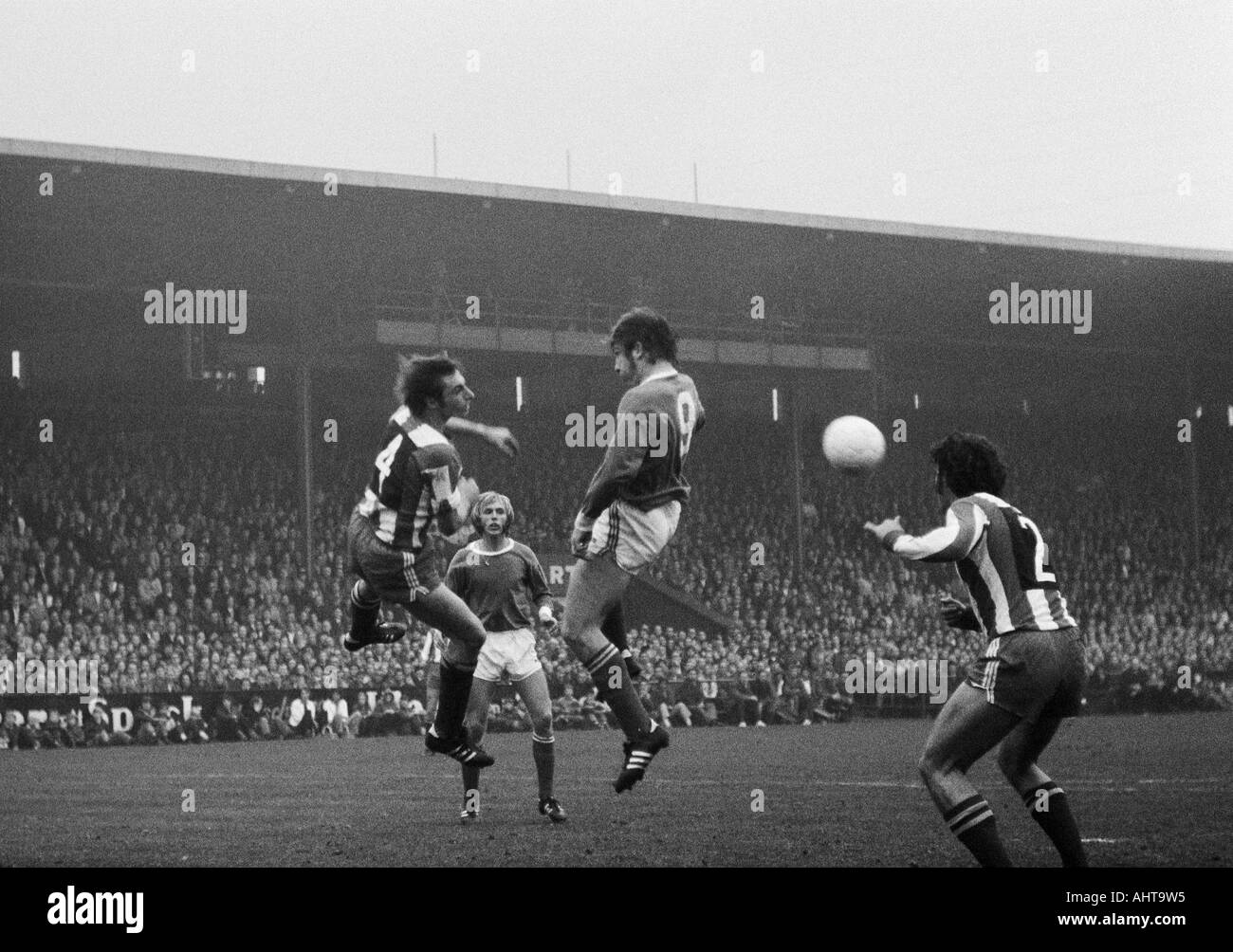 football, Bundesliga, 1971/1972, FC Schalke 04 versus 1. FC Kaiserslautern 3:0, Stadium Glueckaufkampfbahn in Gelsenkirchen, scene of the match, f.l.t.r. Ernst Diehl (FCK), Klaus Scheer, Klaus Fischer (both S04), Guenther Rademacher (FCK) Stock Photo