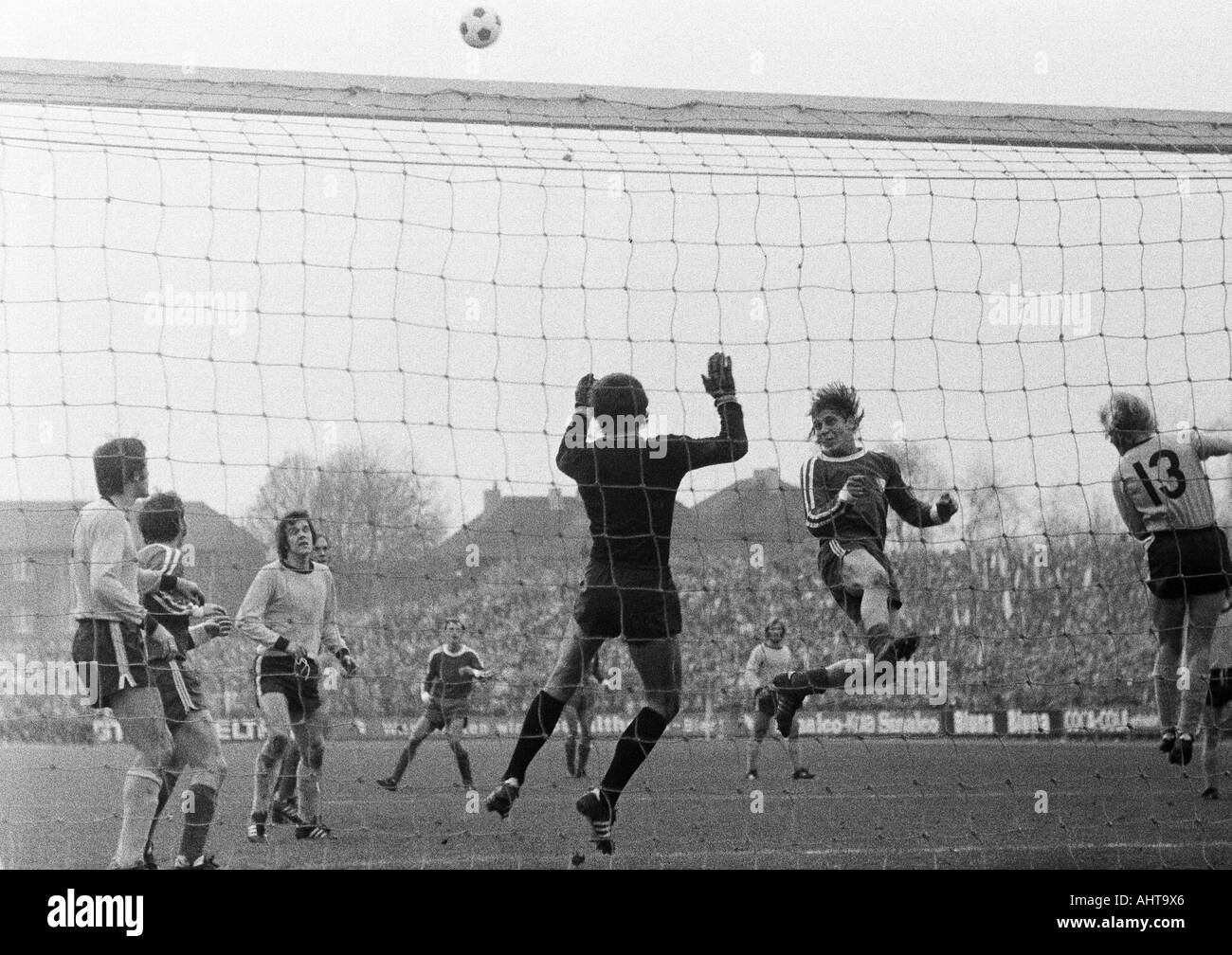 football, Bundesliga, 1971/1972, VfL Bochum versus Borussia Dortmund 4:2, Stadium at the Castroper Strasse in Bochum, scene of the match, f.l.t.r. Branco Rasovic (BVB), Werner Balte (Bochum), Karl Heinz Henke (BVB), Dieter Versen (Bochum), keeper Juergen Stock Photo