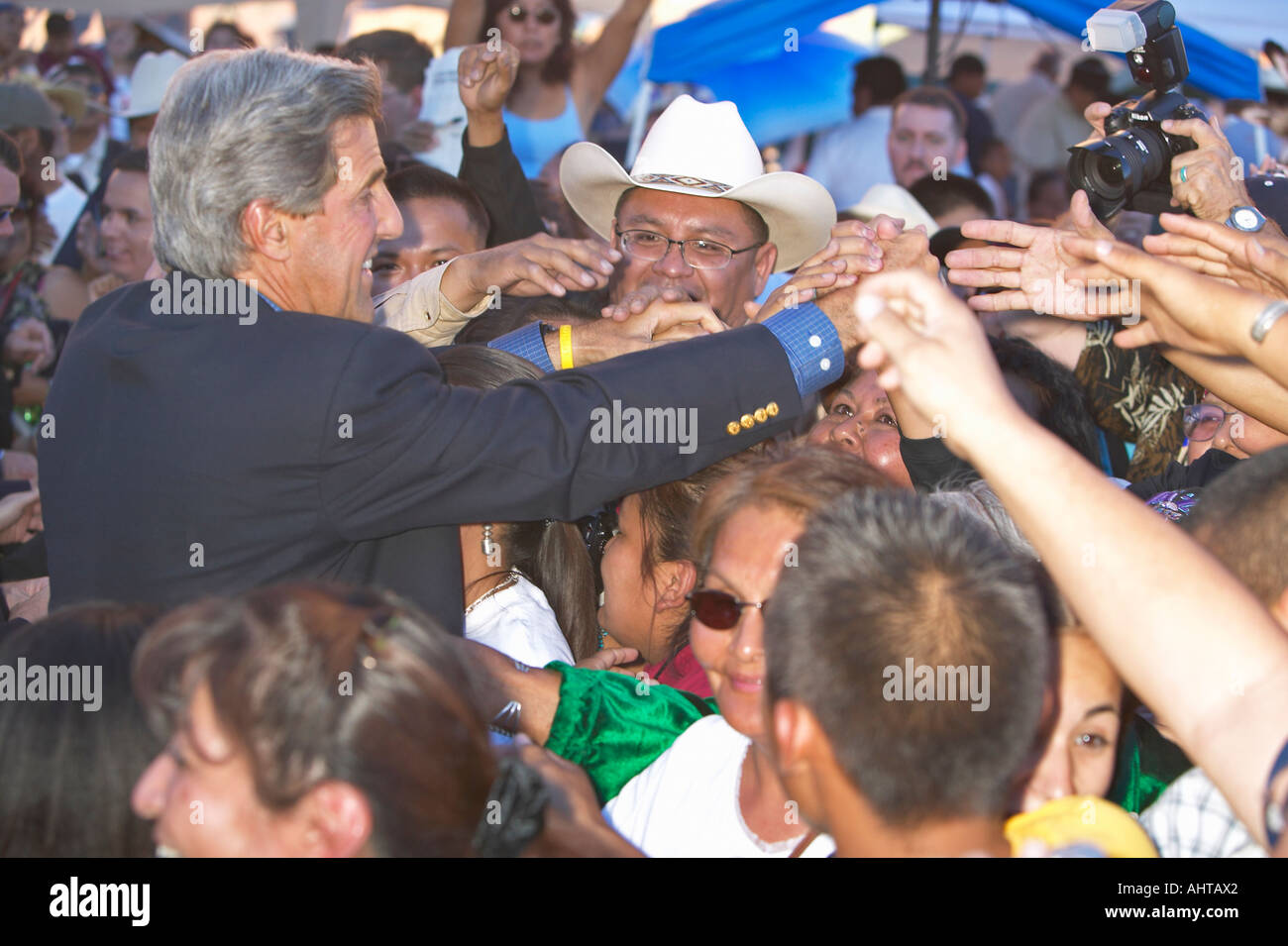 Senator John Kerry handshakes with audience members of 83rd Intertribal Indian Ceremony Gallup NM Stock Photo