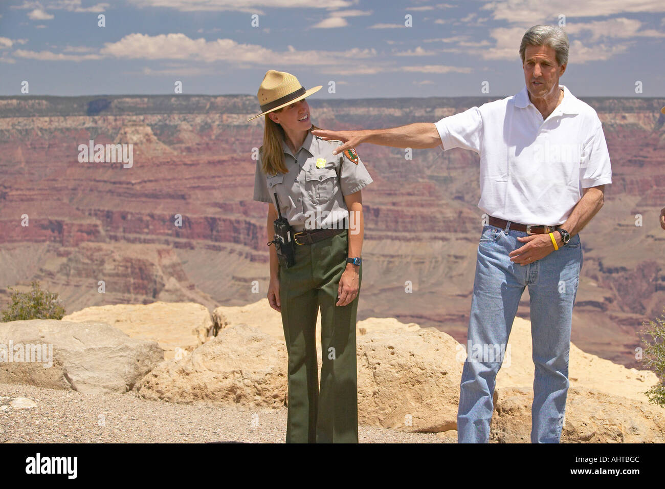 Senator John Kerry speaking with ranger at rim of Bright Angel Lookout Grand Canyon AZ Stock Photo