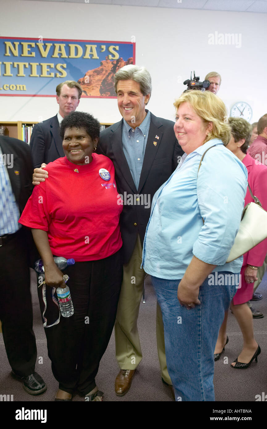 Senator John Kerry poses with two attendees at the Ralph Cadwallader Middle  School Las Vegas NV Stock Photo - Alamy