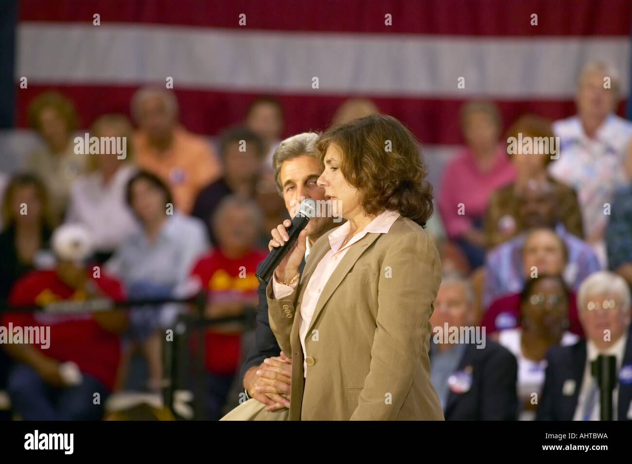 Teresa Heinz Kerry with Senator John Kerry addressing audience of