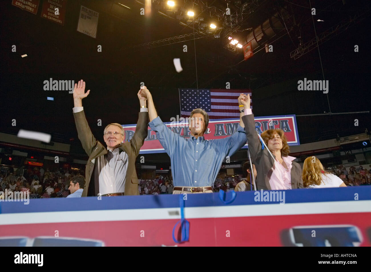 Senator John Kerry with wife Teresa and Senator Harry Reid bid farewell