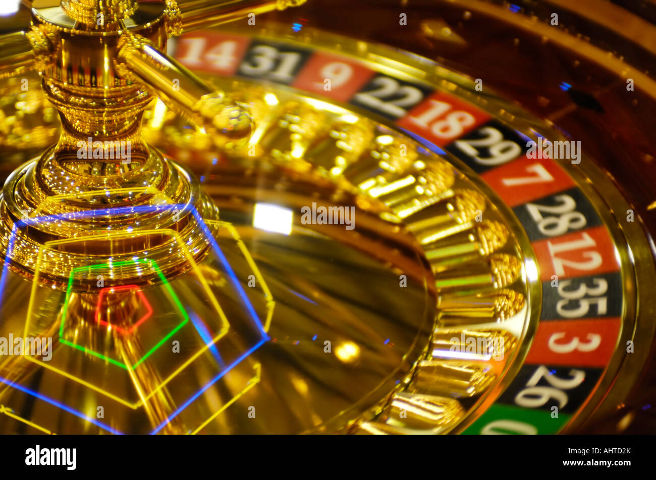 Spinning golden casino roulette Stock Photo - Alamy