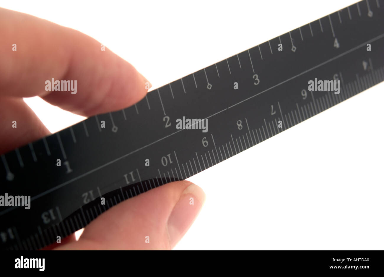 hand with tape measure rule ruler Stock Photo Alamy