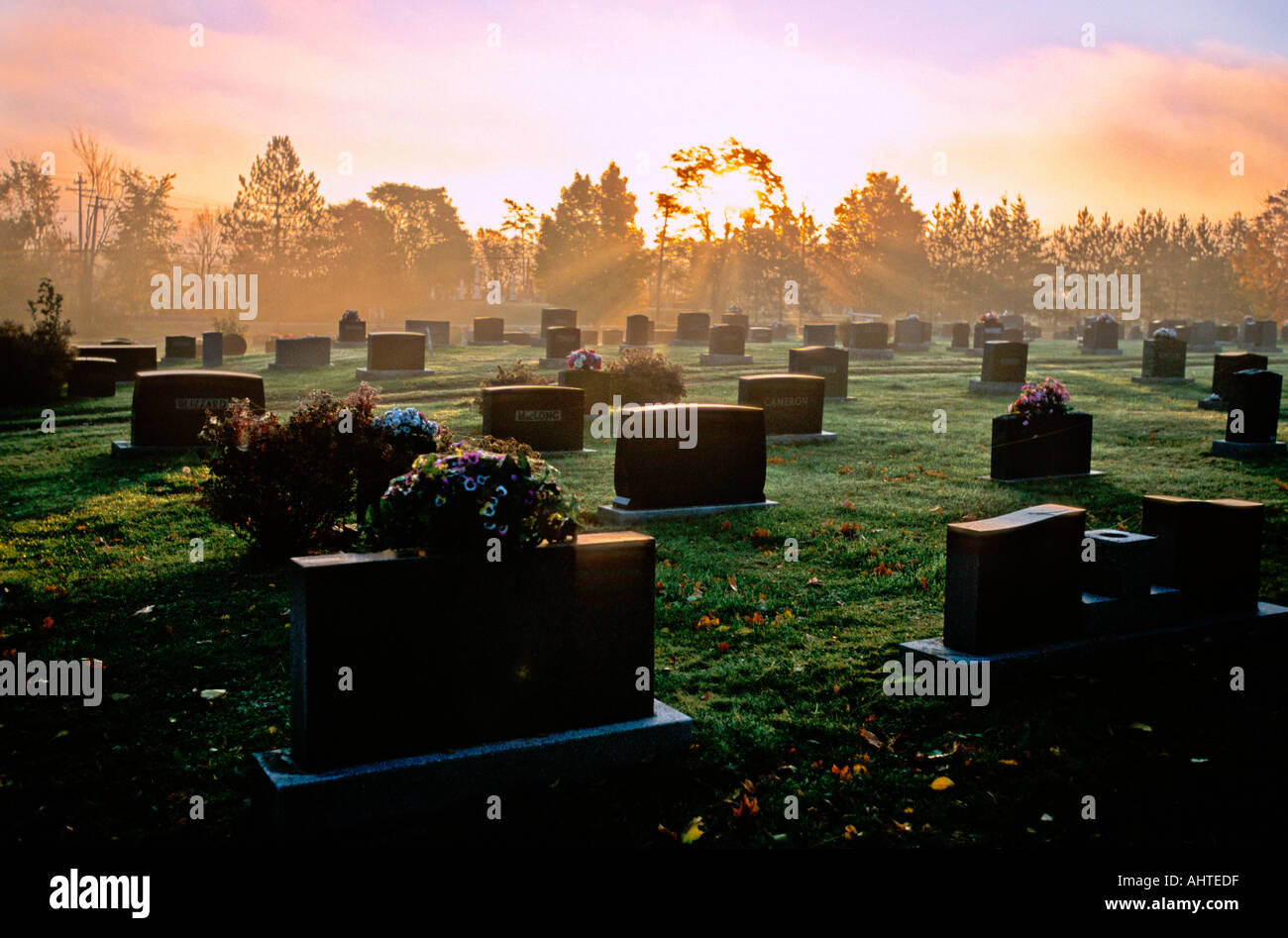God Rays on the grave markers Stock Photo
